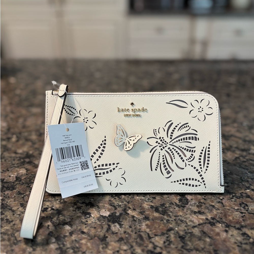 Kate Spade ♠️ Lucy Festival Perforated Floral Wristlet